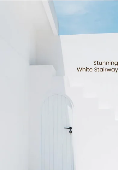 White Mediterranean stairway and an arched door against the sky