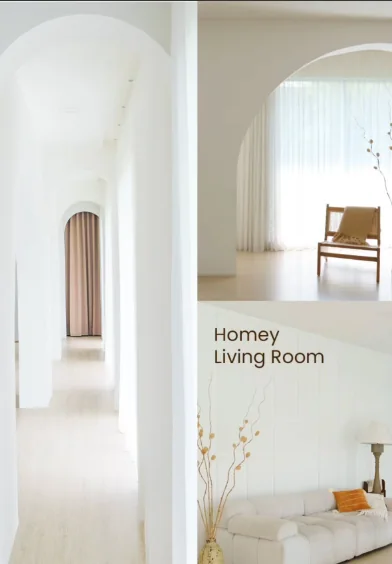 Arched white hallway and a living room set with a cream sofa